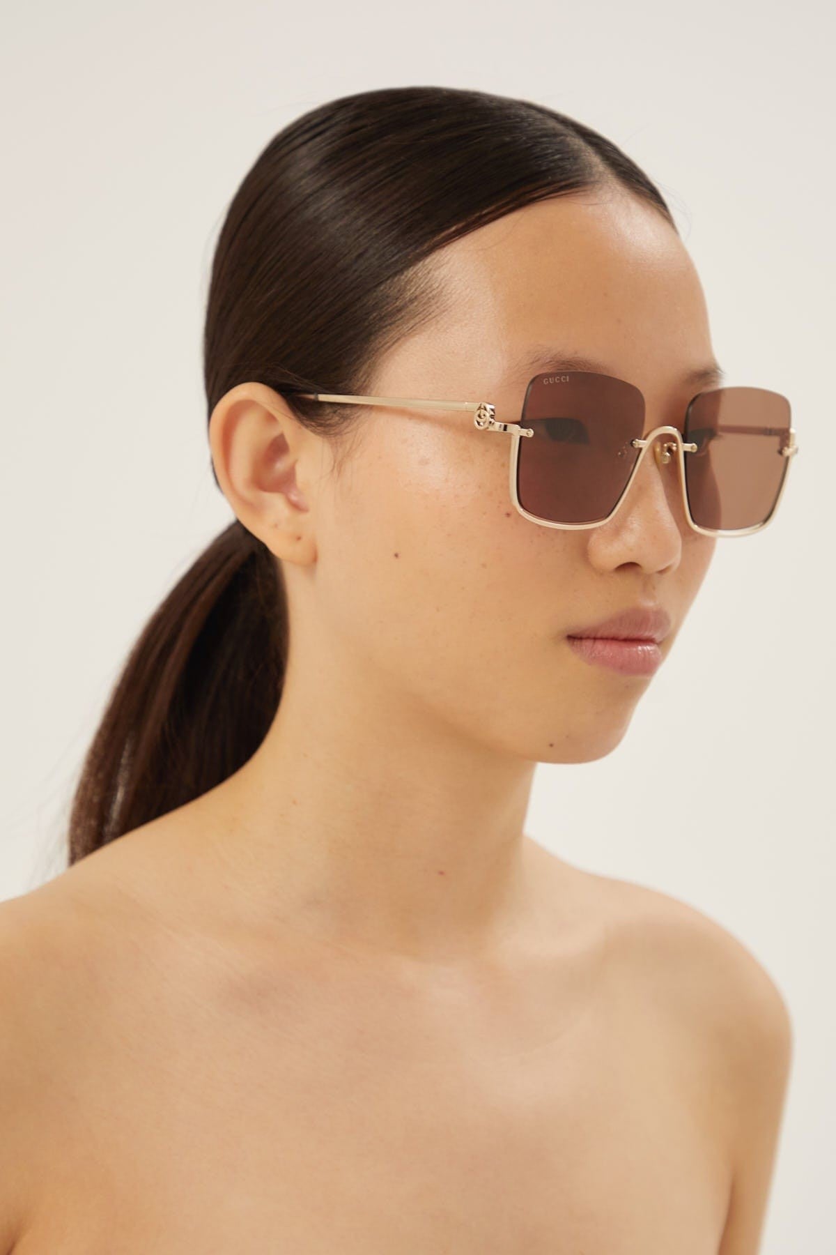 Gucci metal squared sunglasses with brown lenses