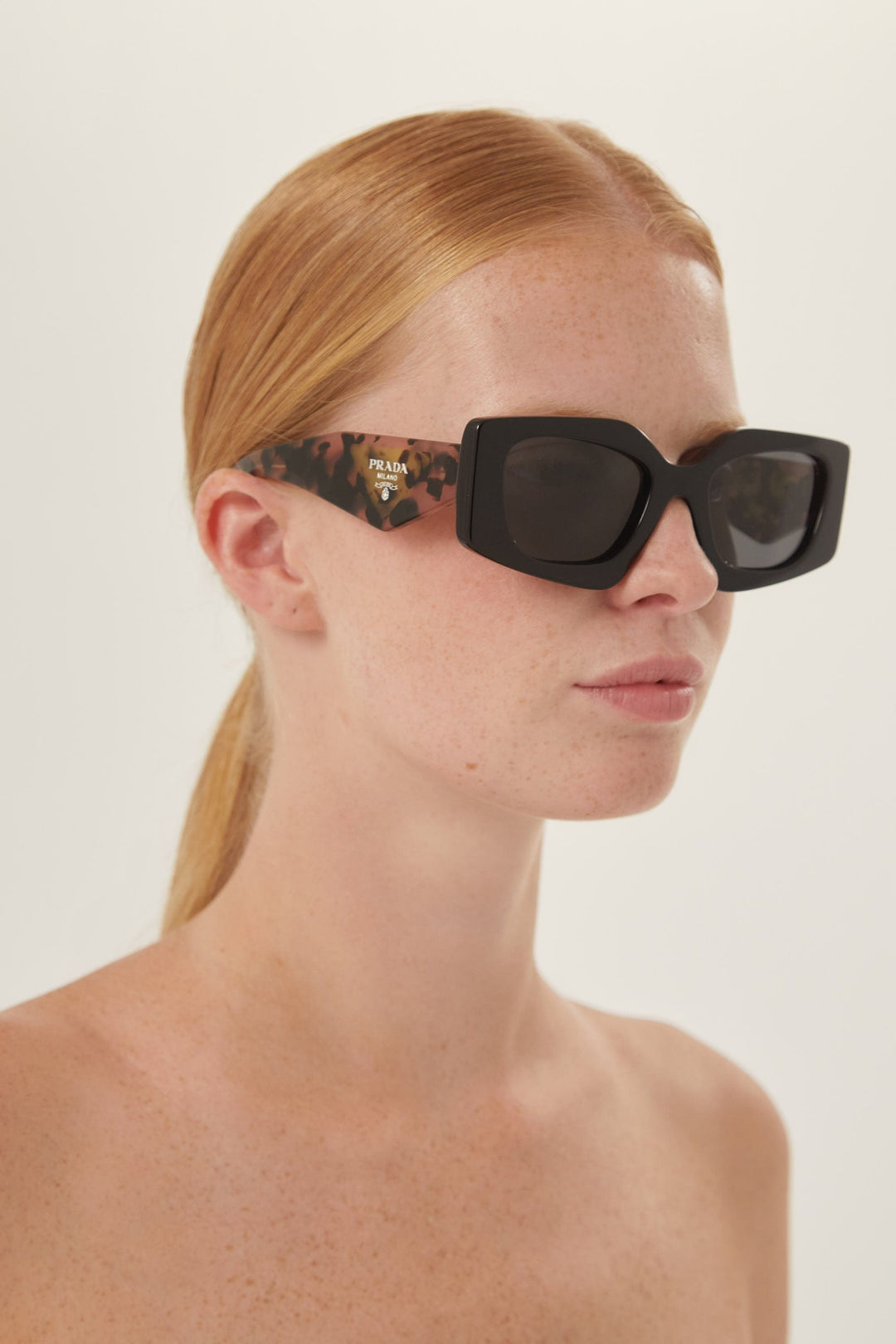 Prada geometrical black sunglasses