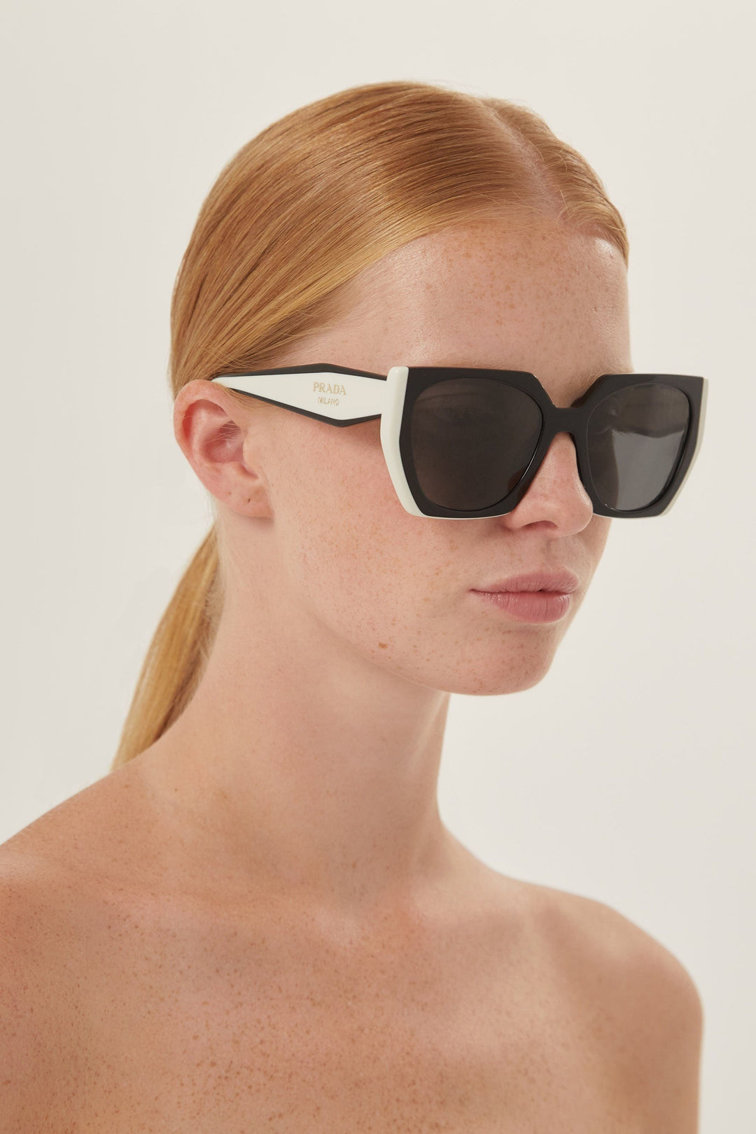 Prada oversized cat eye black and white sunglasses