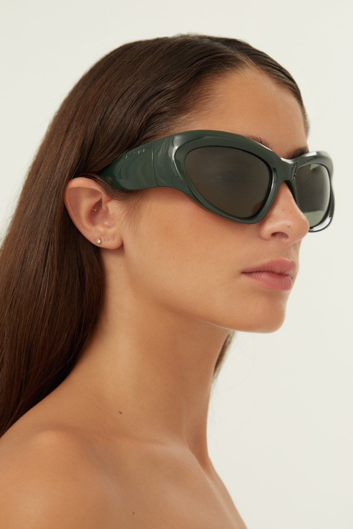 Balenciaga bold wrap around green sunglasses