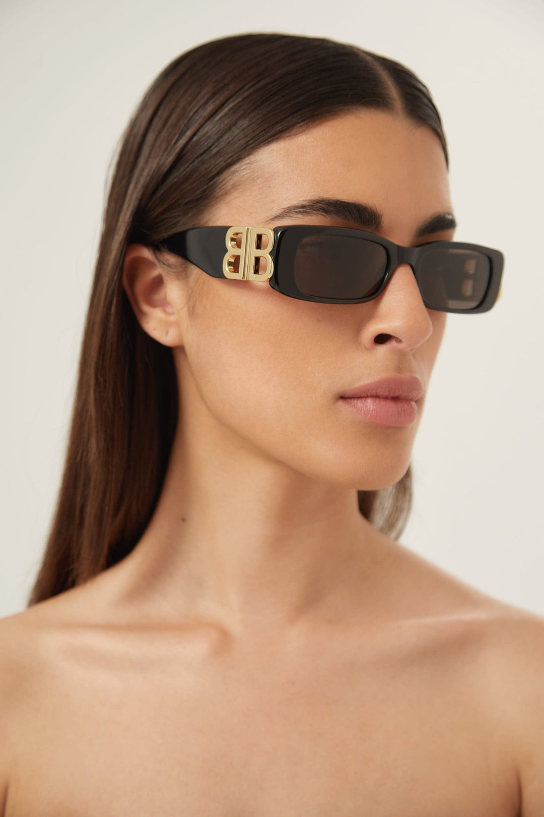 Balenciaga Dynasty black sunglasses featuring BB gold logo