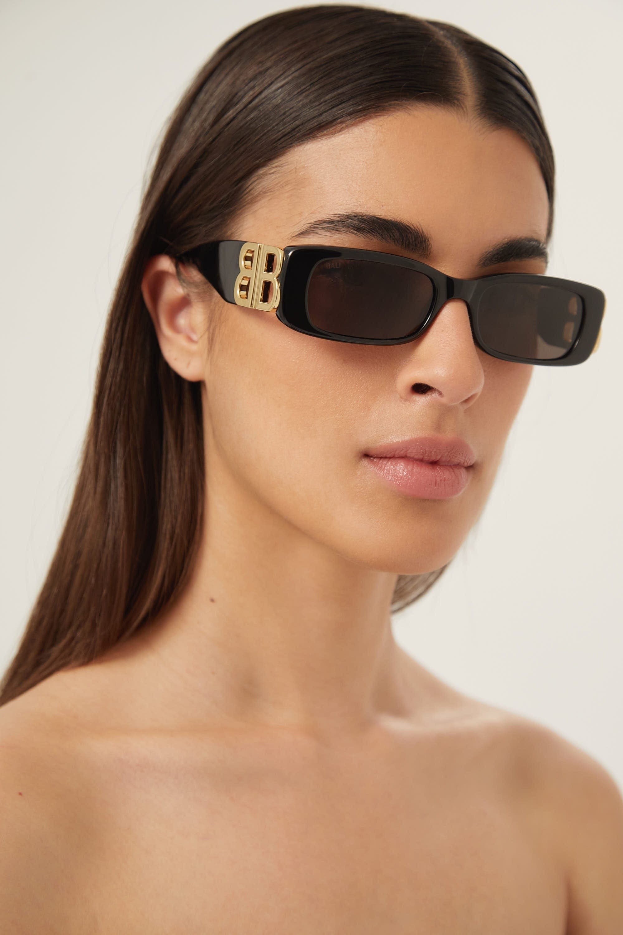 Balenciaga Dynasty black sunglasses featuring BB gold logo