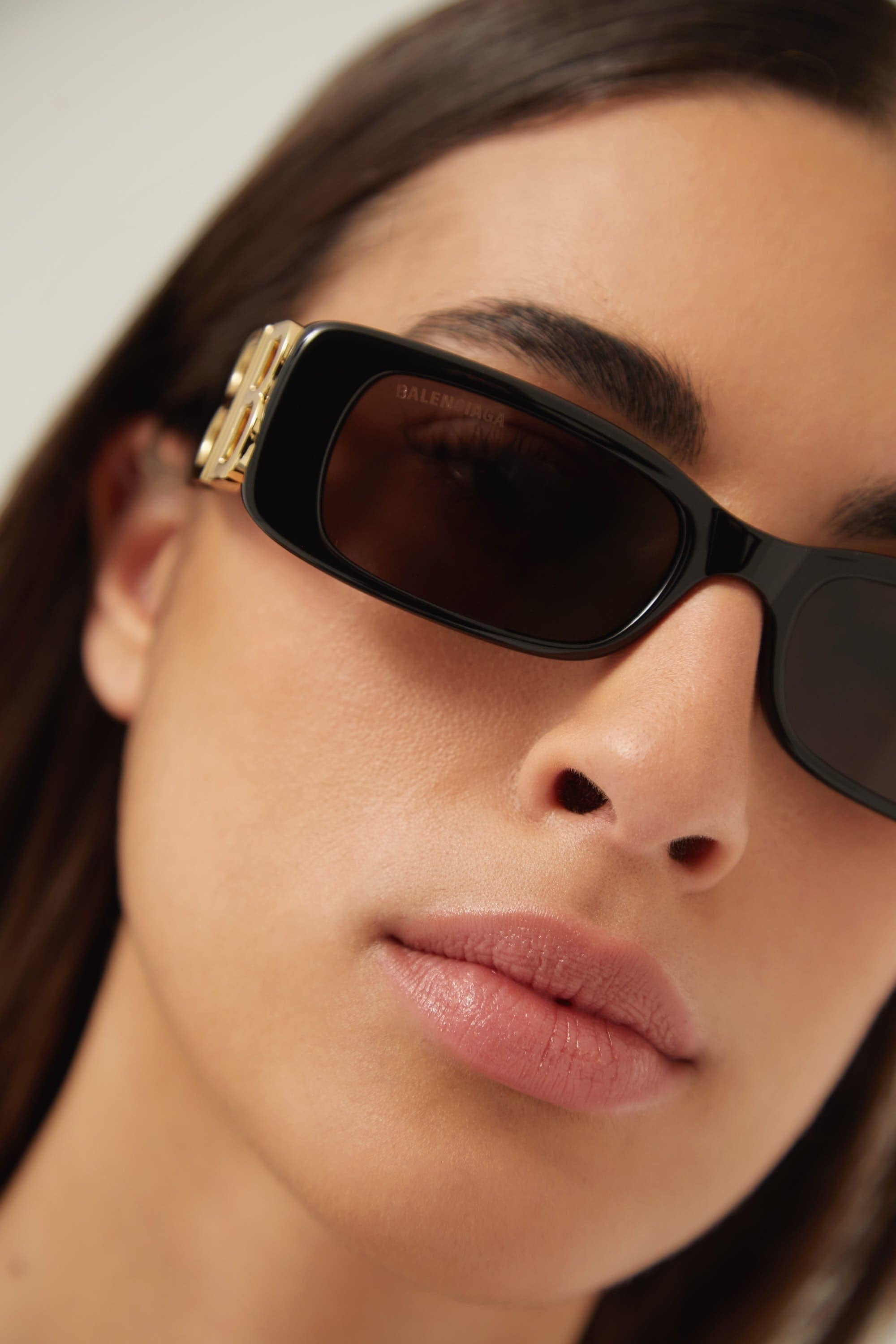 Balenciaga Dynasty black sunglasses featuring BB gold logo