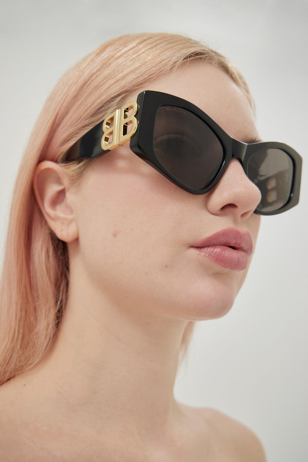 Balenciaga Dynasty over black sunglasses featuring BB gold logo