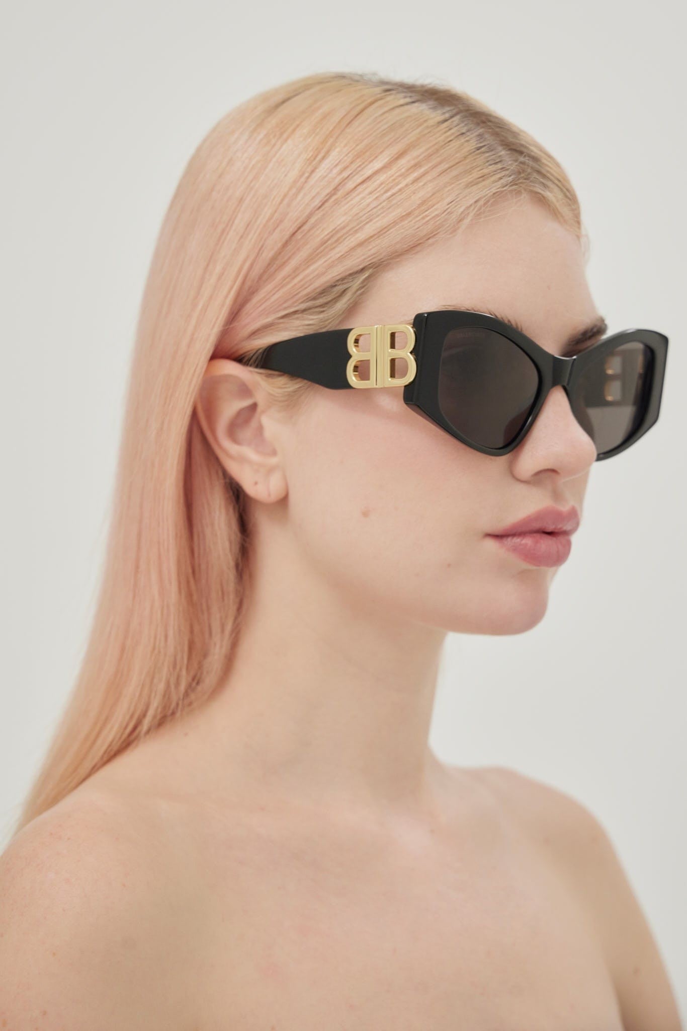 Balenciaga Dynasty over black sunglasses featuring BB gold logo