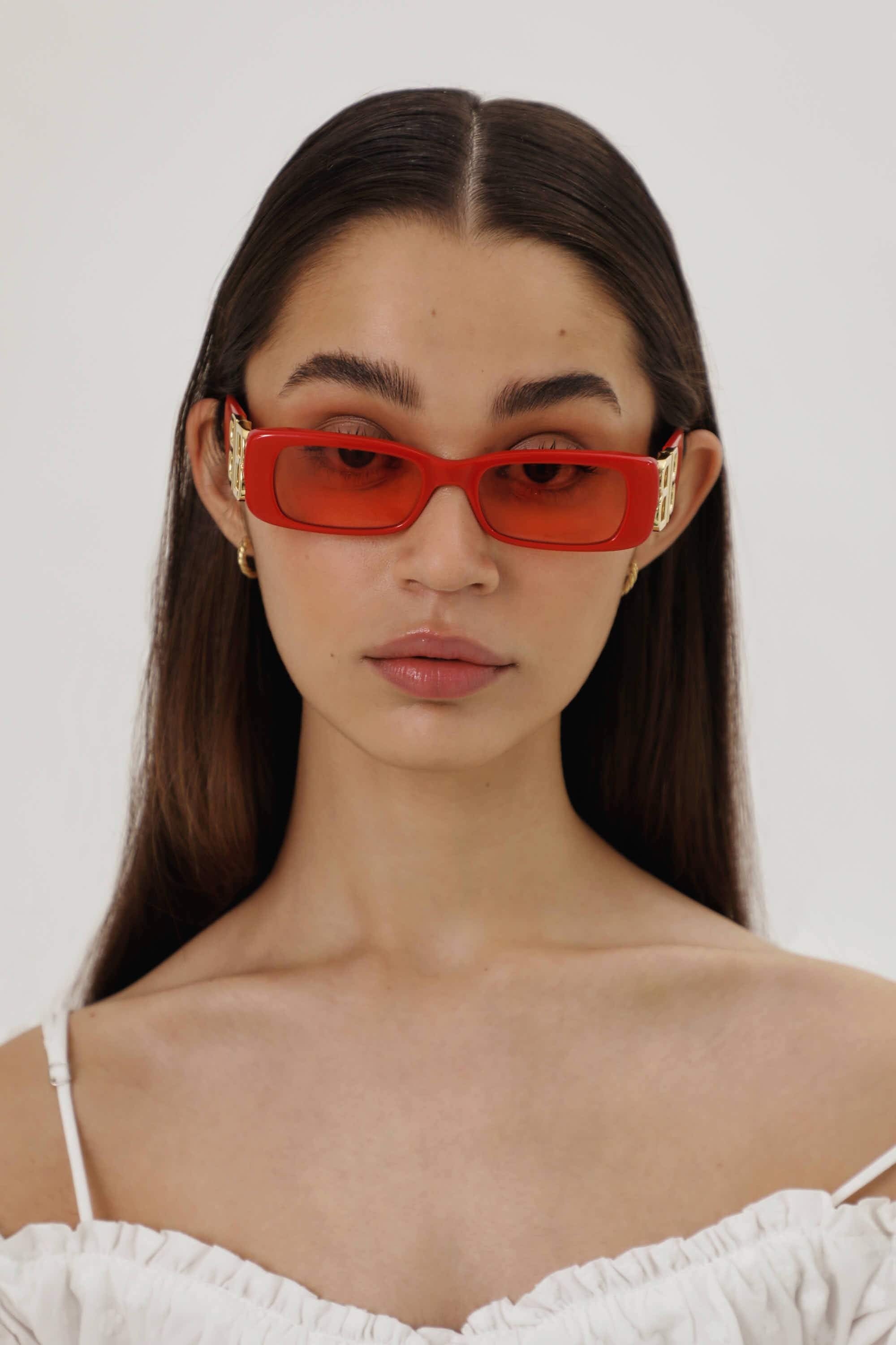 Balenciaga micro red sunglasses featuring BB logo