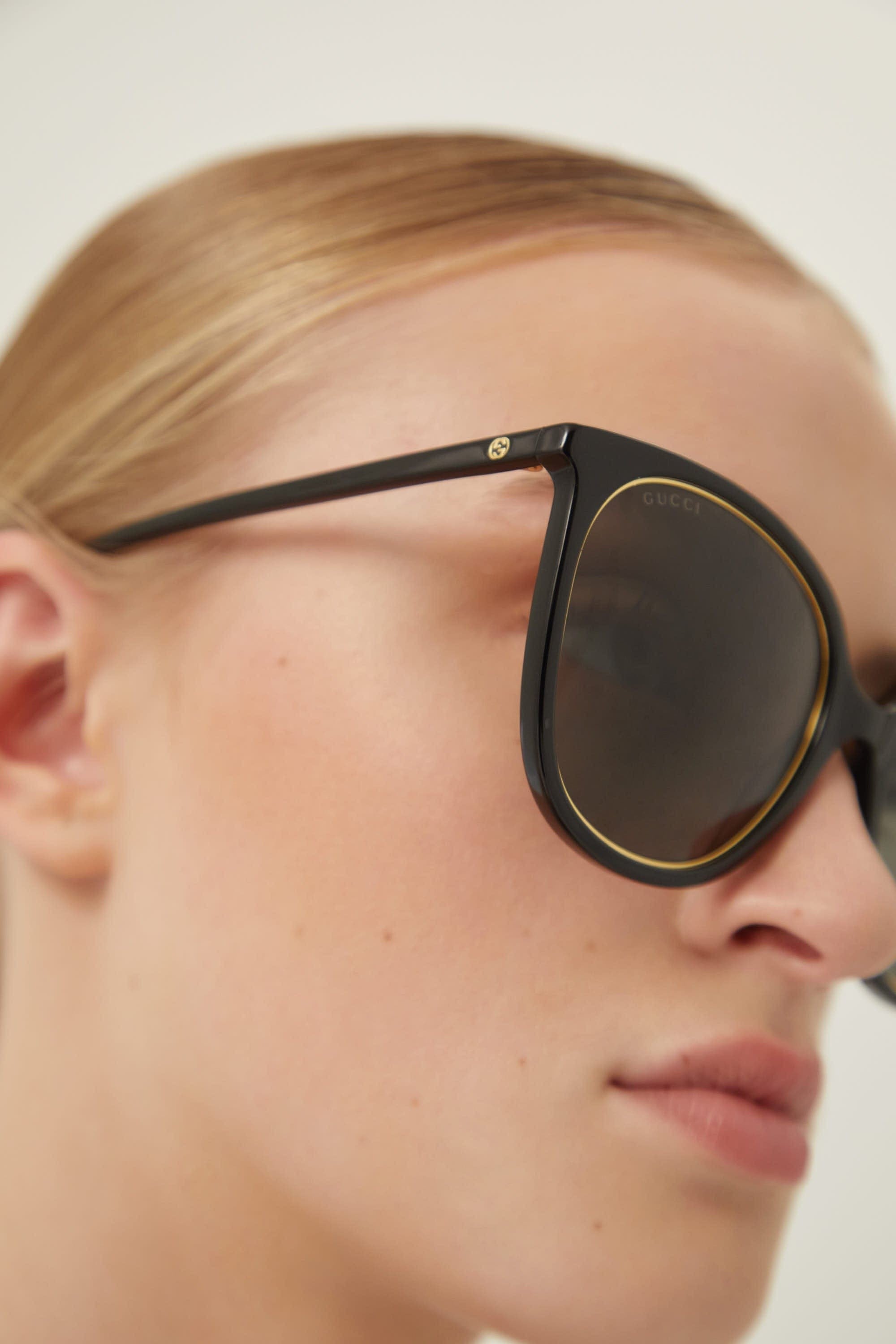 Gucci black cat-eye sunglasses with chain