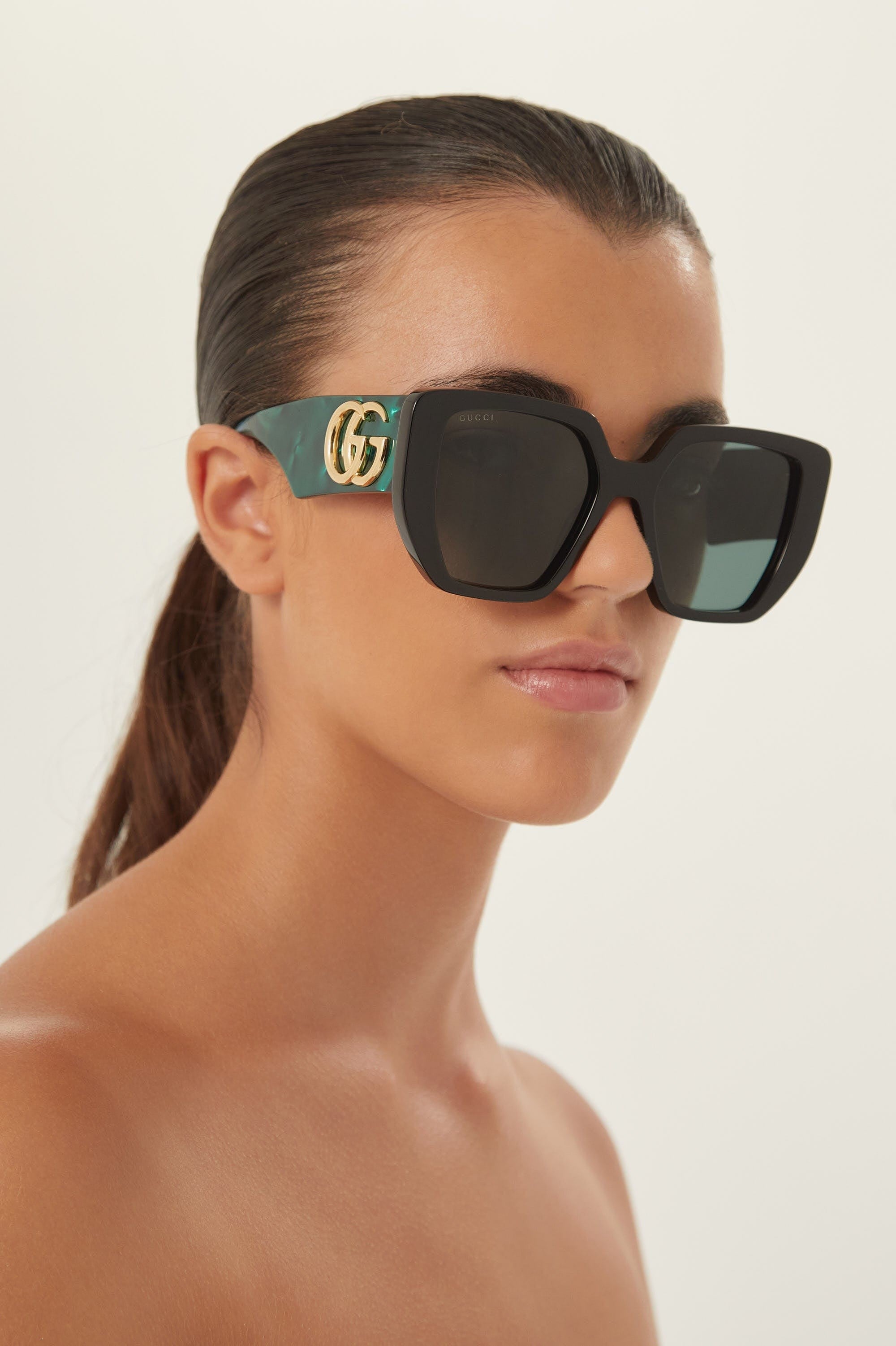 Gucci GG0956S oversized black and green sunglasses with maxi logo