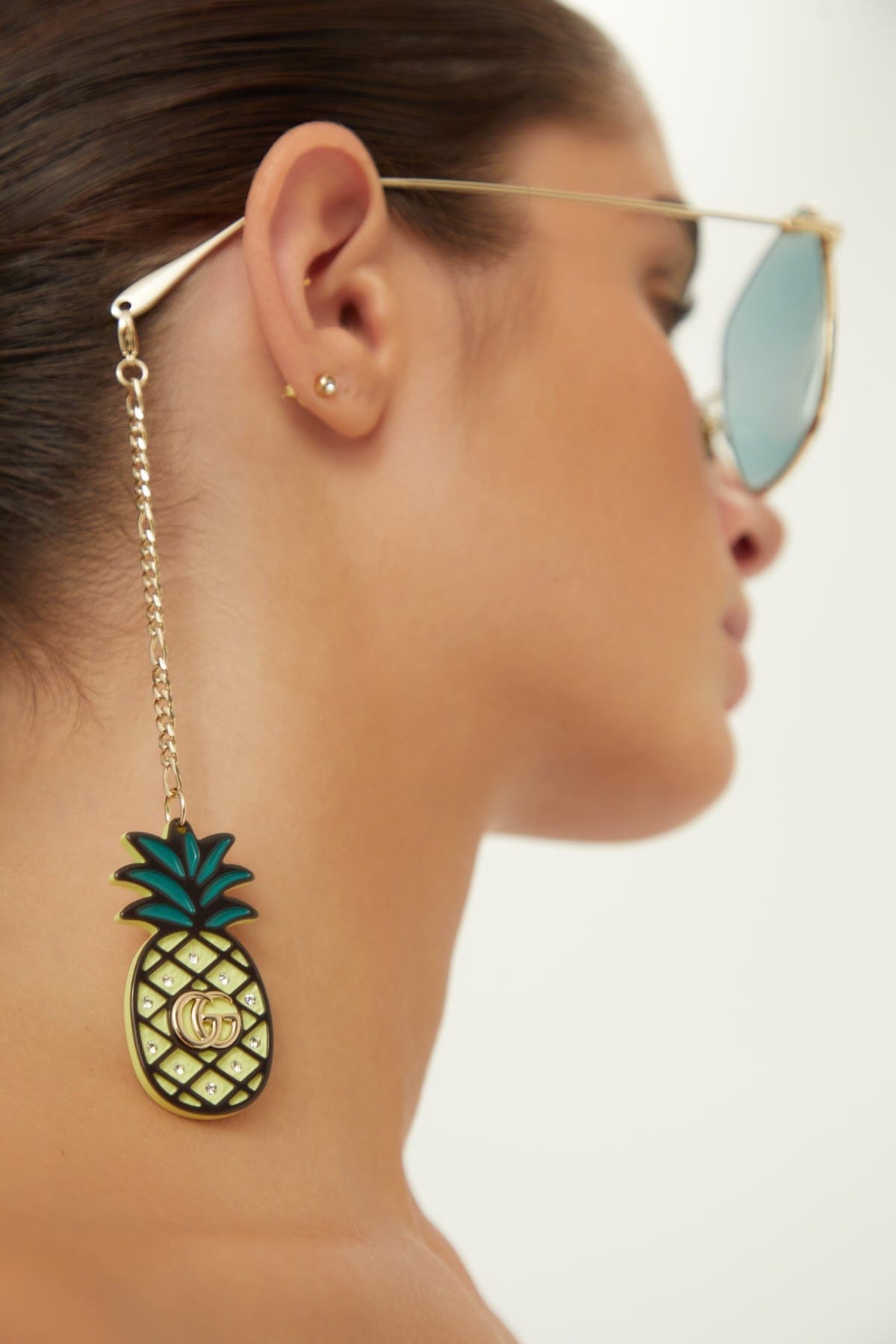 Gucci gold squared sunglasses with pineapple charms