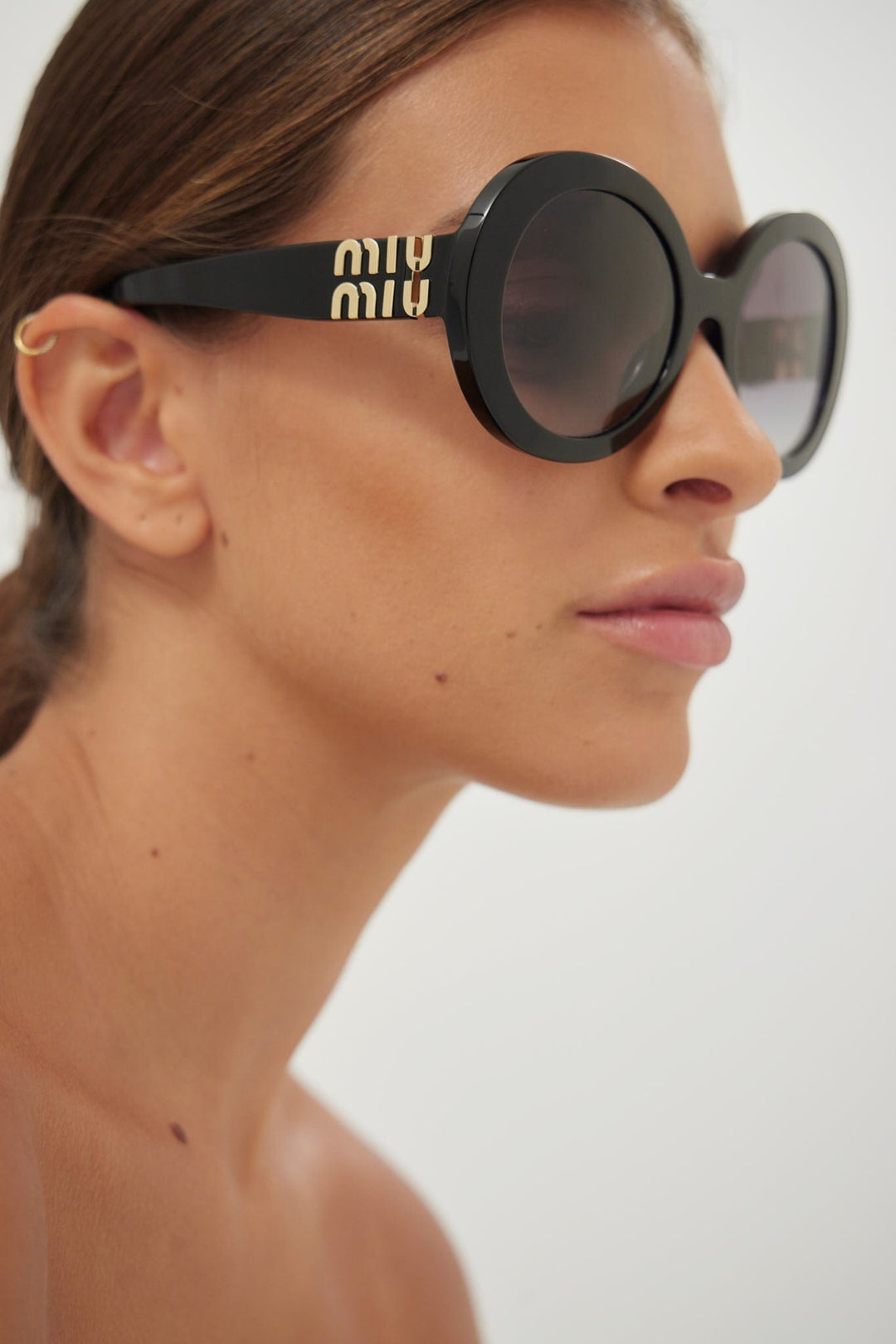 Miu Miu round black sunglasses