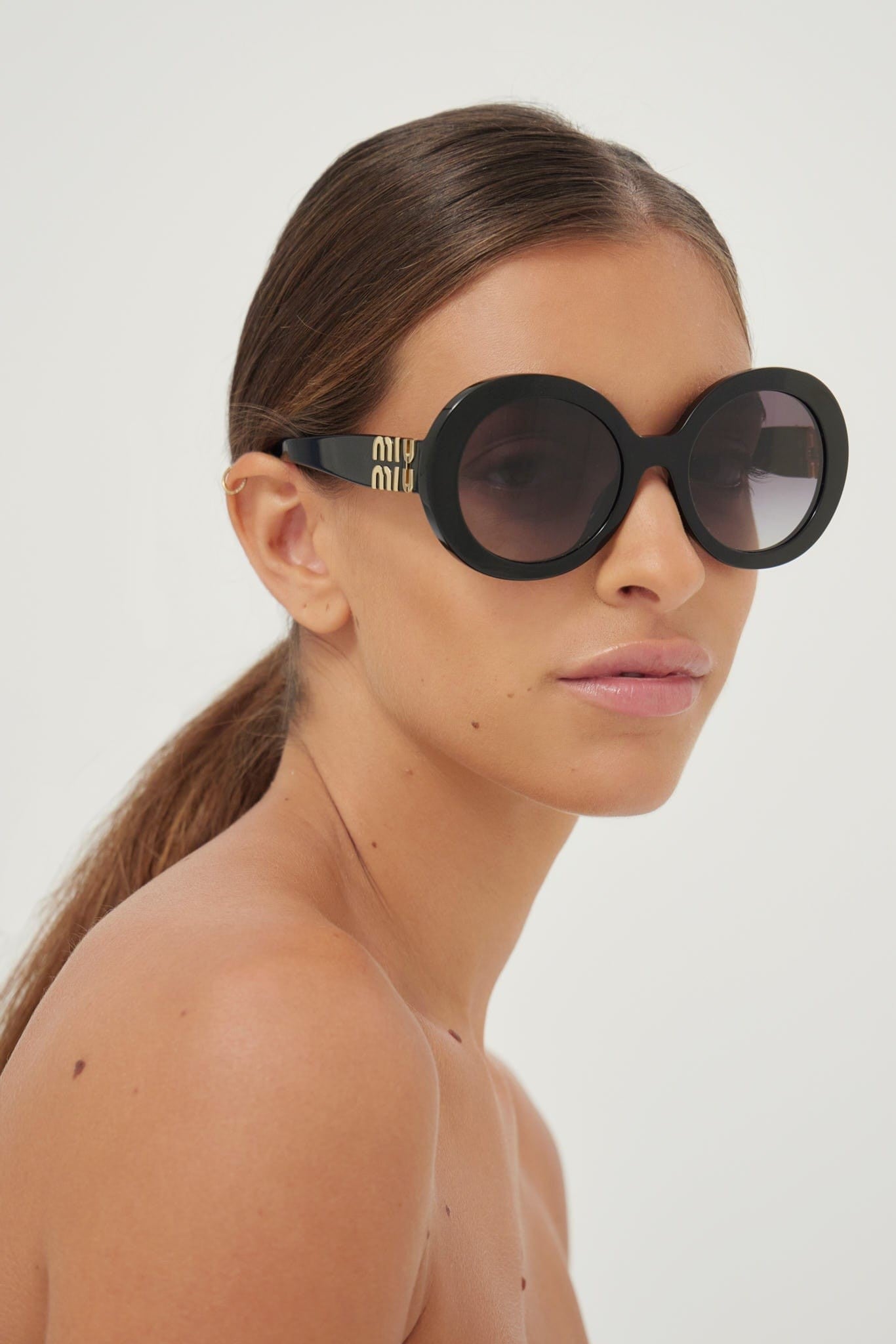 Miu Miu round black sunglasses