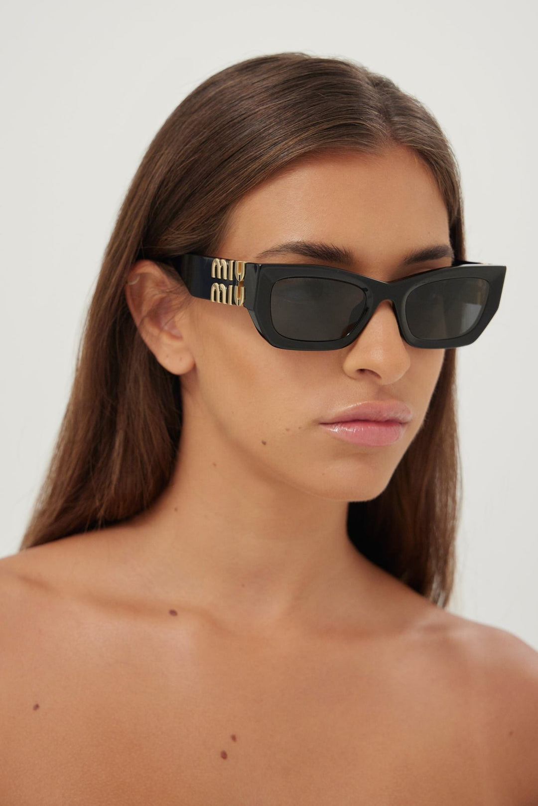 Miu Miu small cat-eye black sunglasses