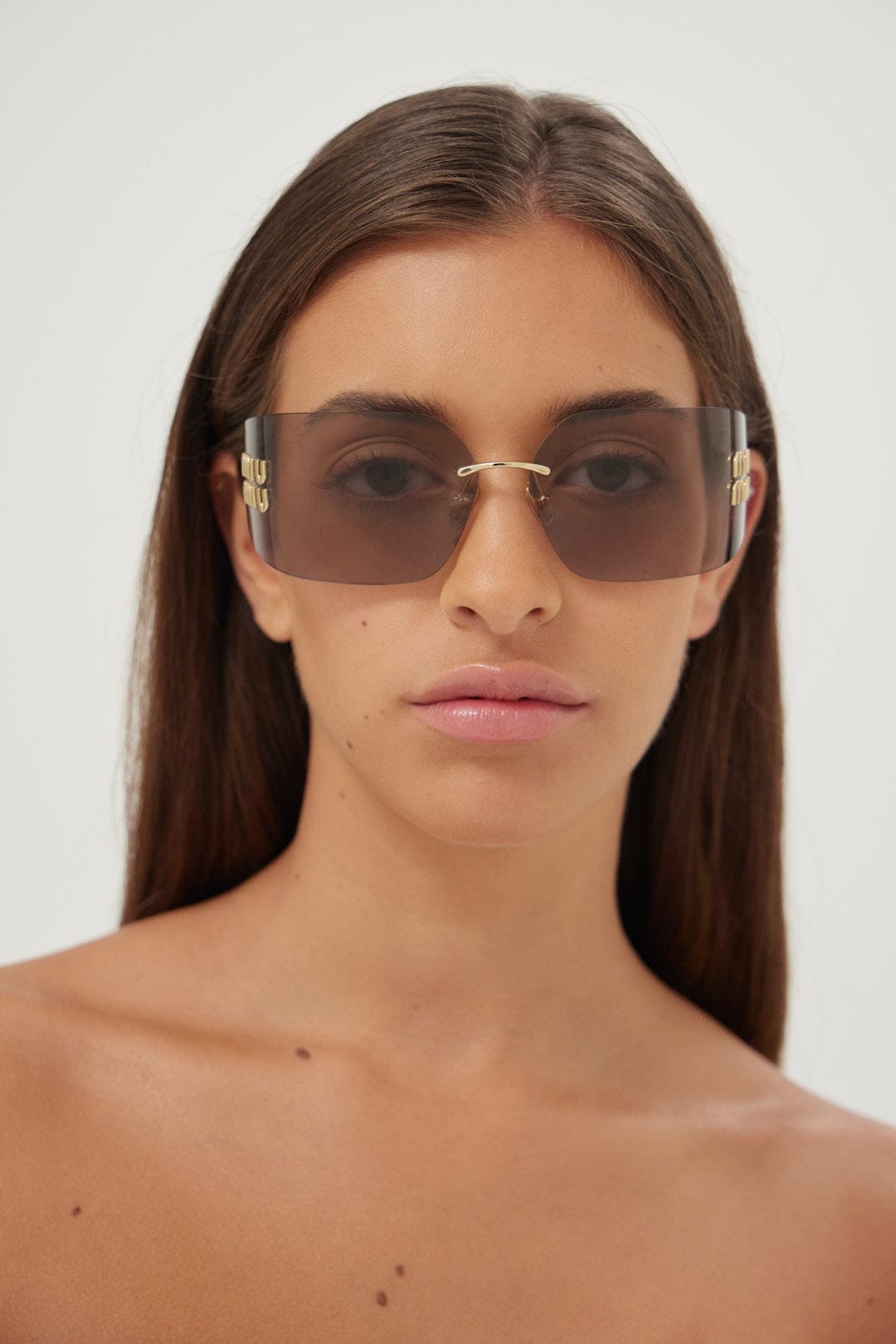 Miu Miu squared metal sunglasses with pink mirror and gold detail