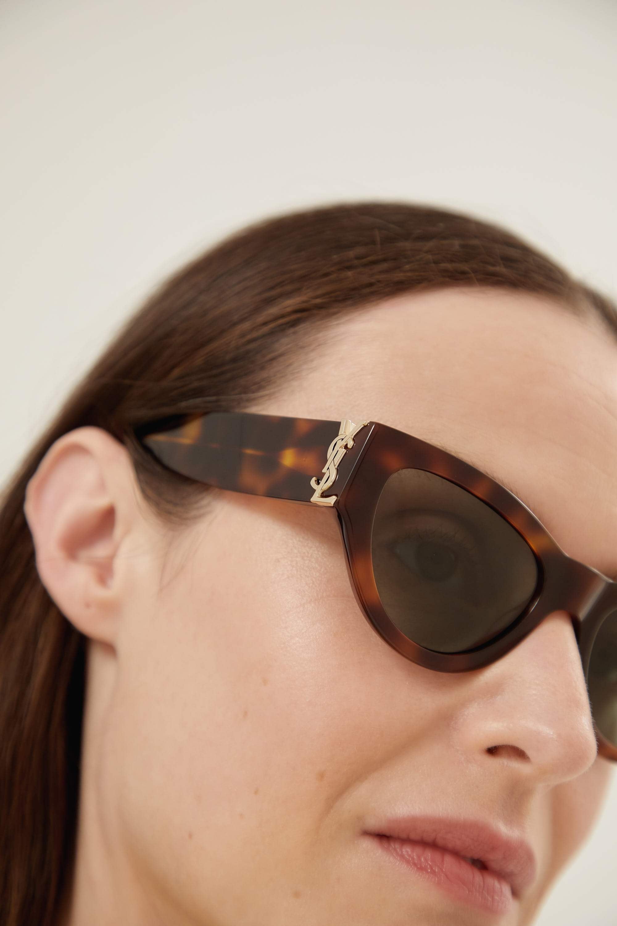 Saint Laurent havana almond shape featuring bold YSL logo