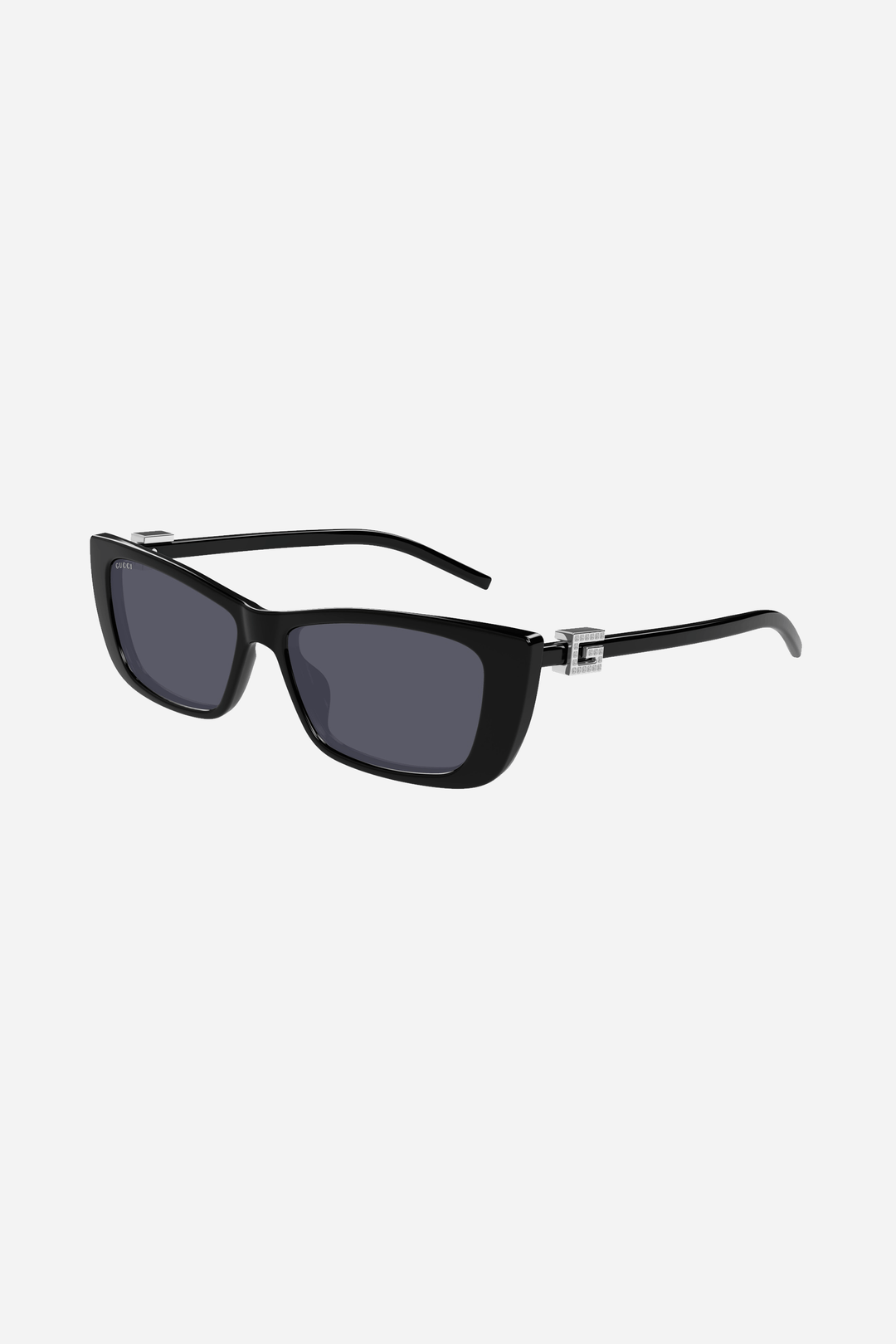 Black cat-eye Gucci sunglasses with silver logo