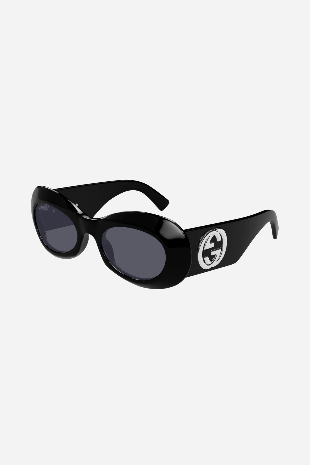 Black oval Gucci sunglasses with grey lense